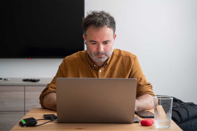 Man reviewing on computer
