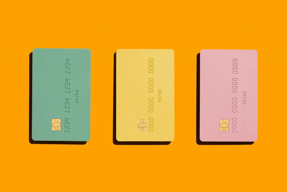 Orange background with credit cards