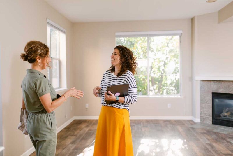 A prospective homebuyer conducts a final walkthrough with her real estate agent.