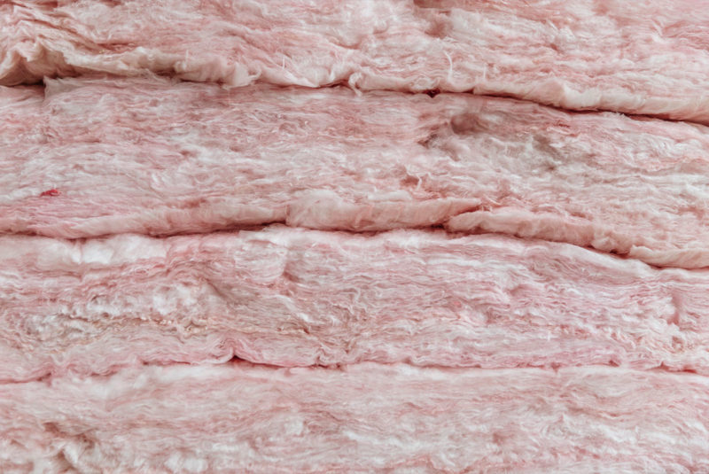 Stack wall of Pink Fiberglass insulation