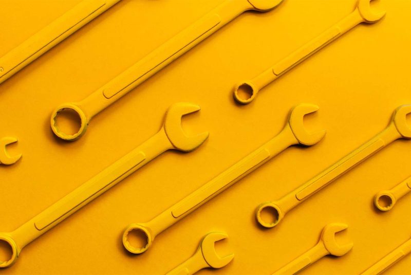 Rows of yellow wrenches
