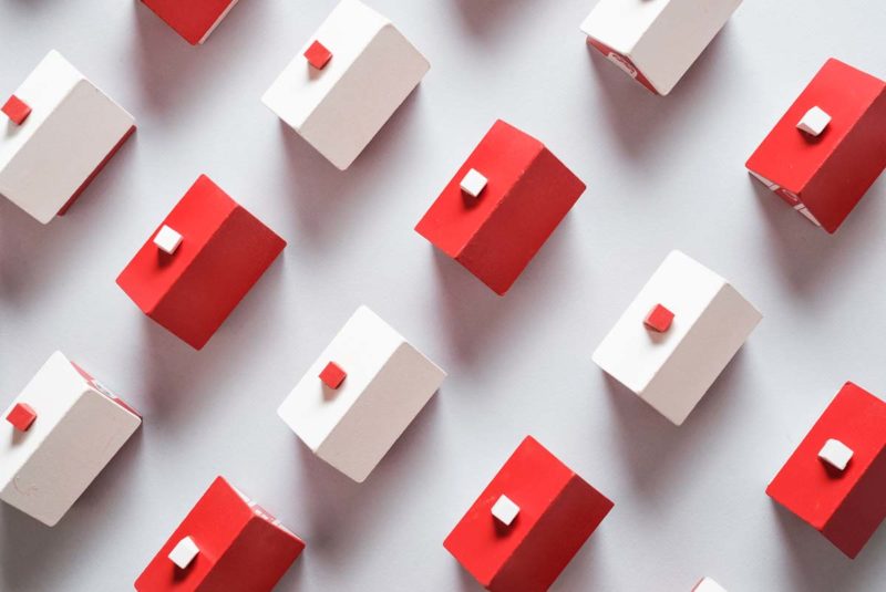 Red and white monopoly houses
