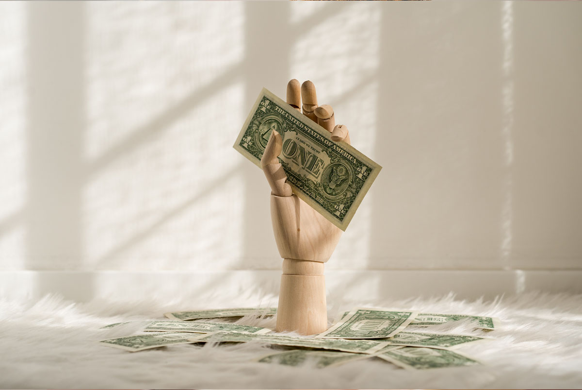 Hand with Dollar bills
