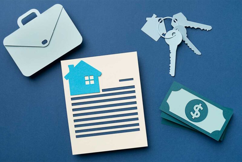 Conceptual image of mortgage paper work and keys to a home