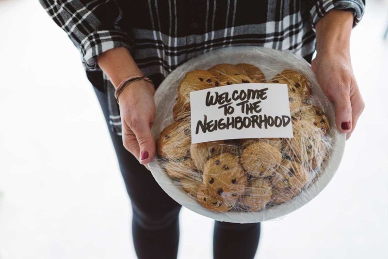 neighbor with plate of cookies