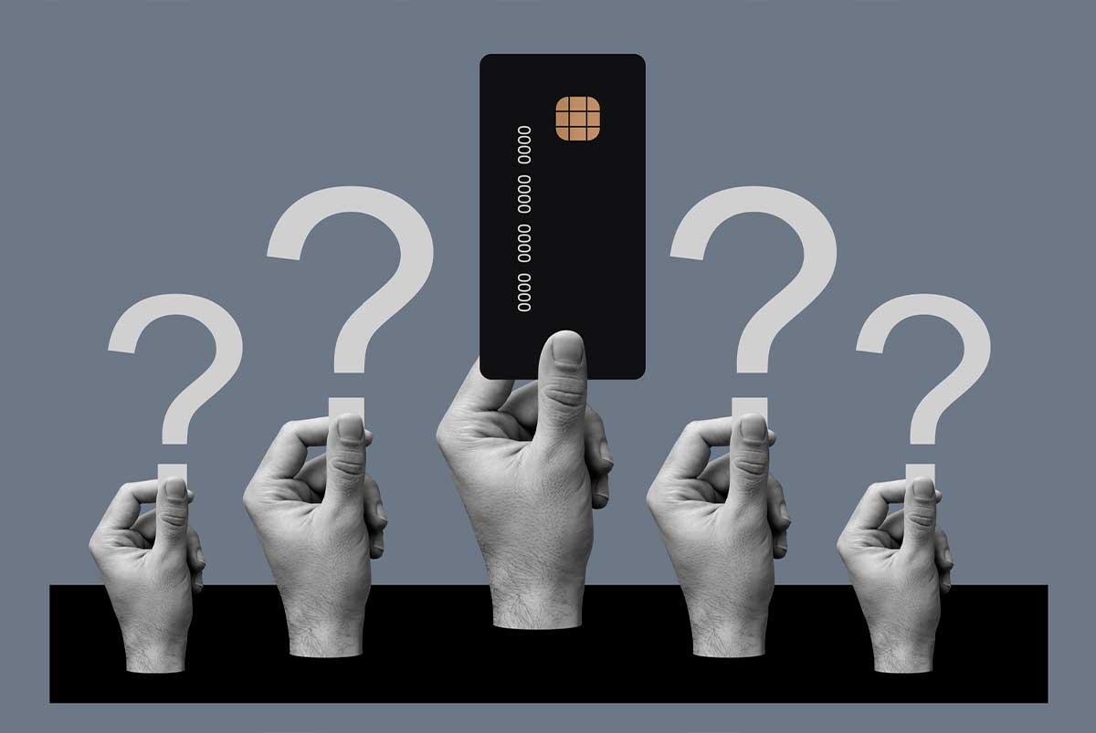 Hands holding question marks and credit card