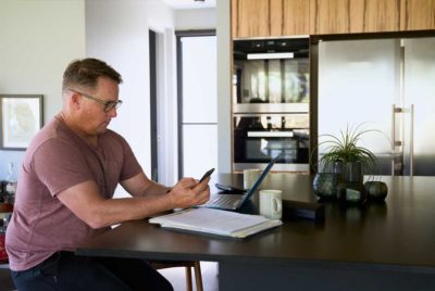 Man sitting at a laptop