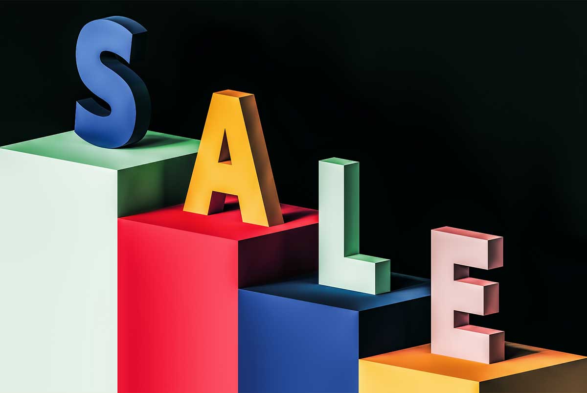 Sale in 3D letters on colored blocks
