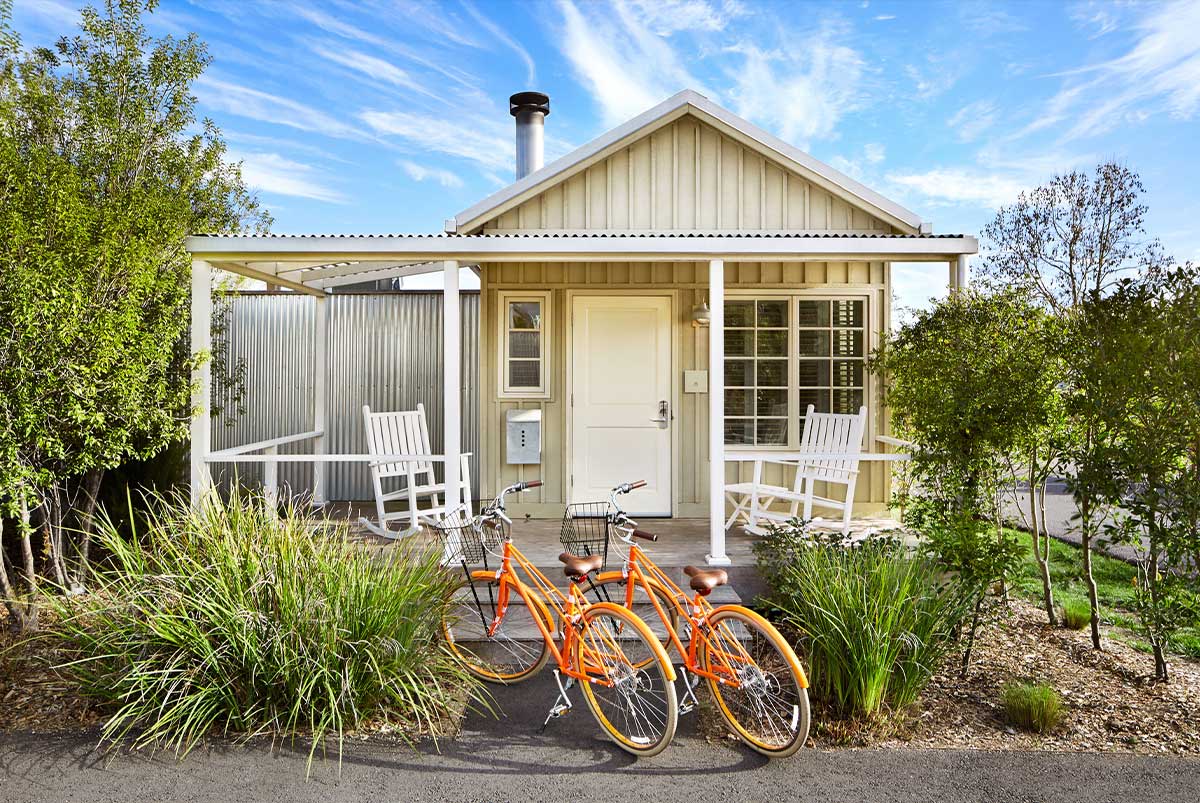 Porch with two bikes in front