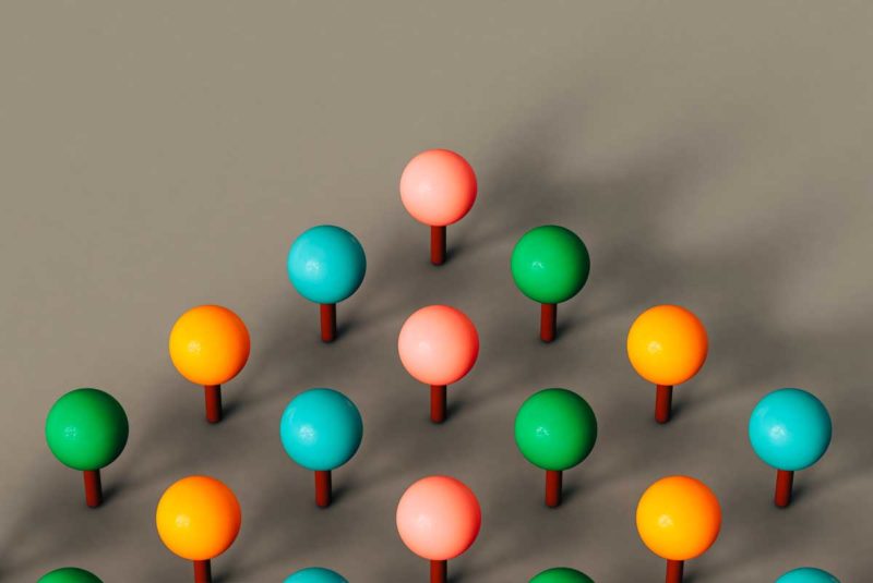 Different colored balls on pegs