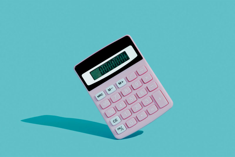 pink calculator on a blue background