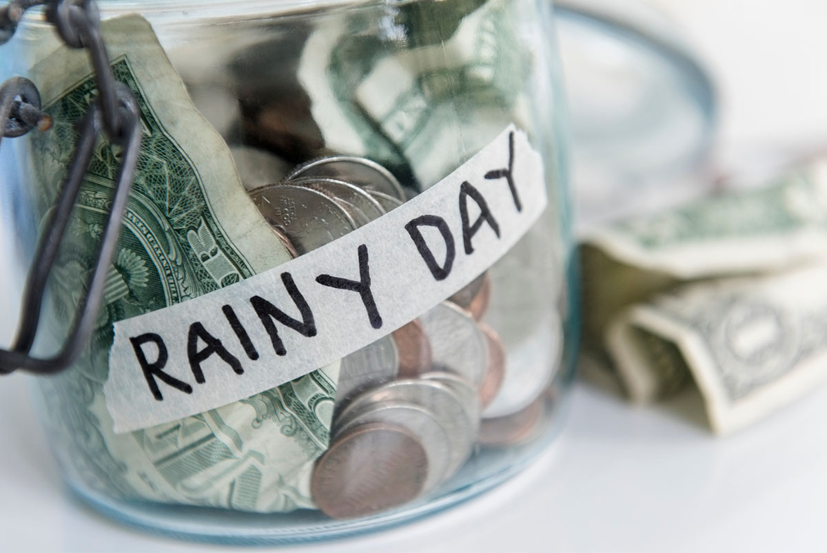 Jar of money labeled rainy day