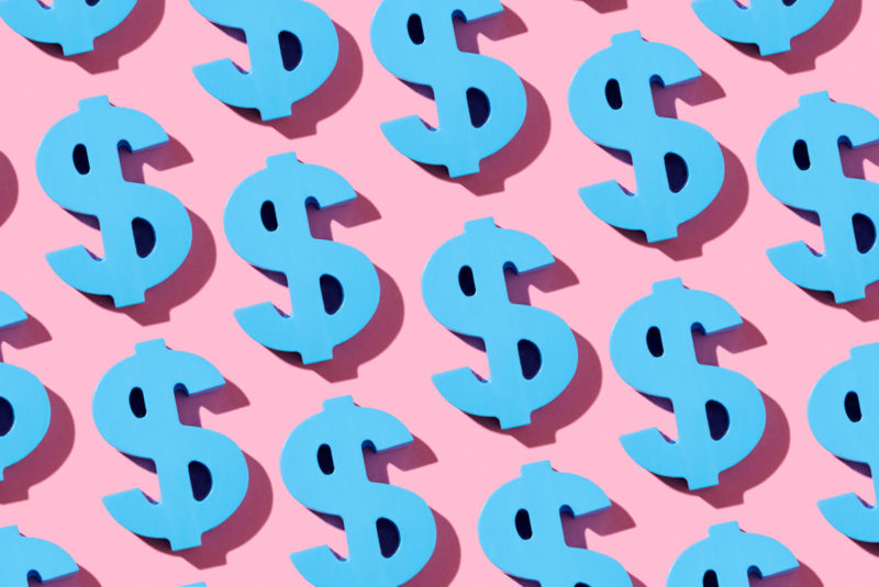 blue dollar signs on a pink background