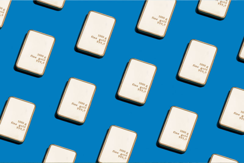 render of gold bars on a blue background