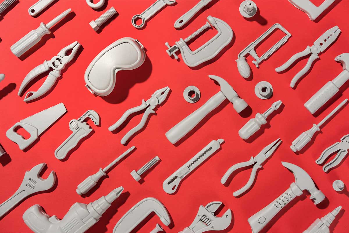 Tools on red background
