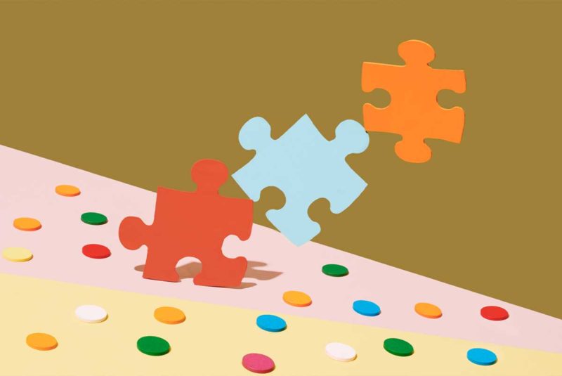 Puzzle pieces and polka dot table