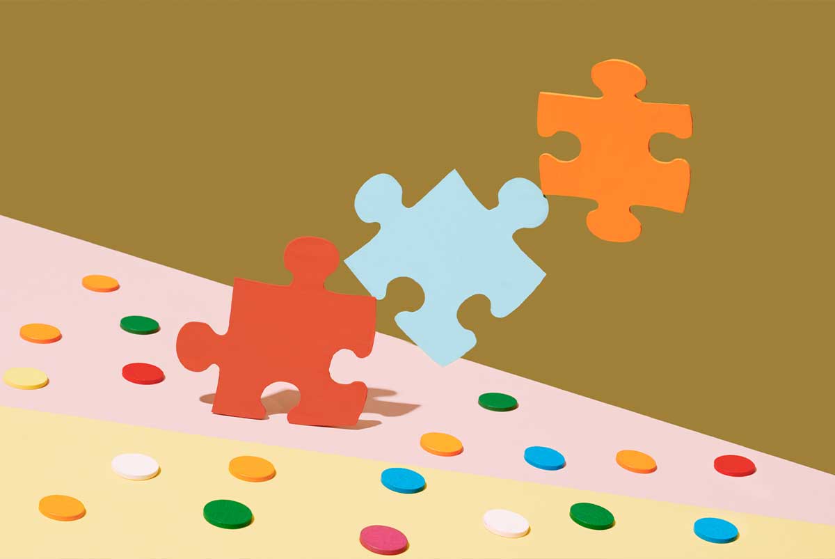Puzzle pieces and polka dot table